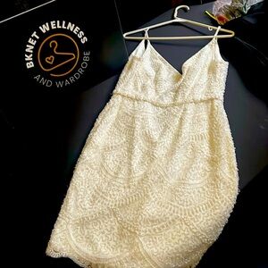 White beautifully beaded dress